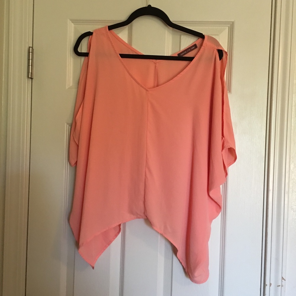 happening in the present Orange Rayon Top